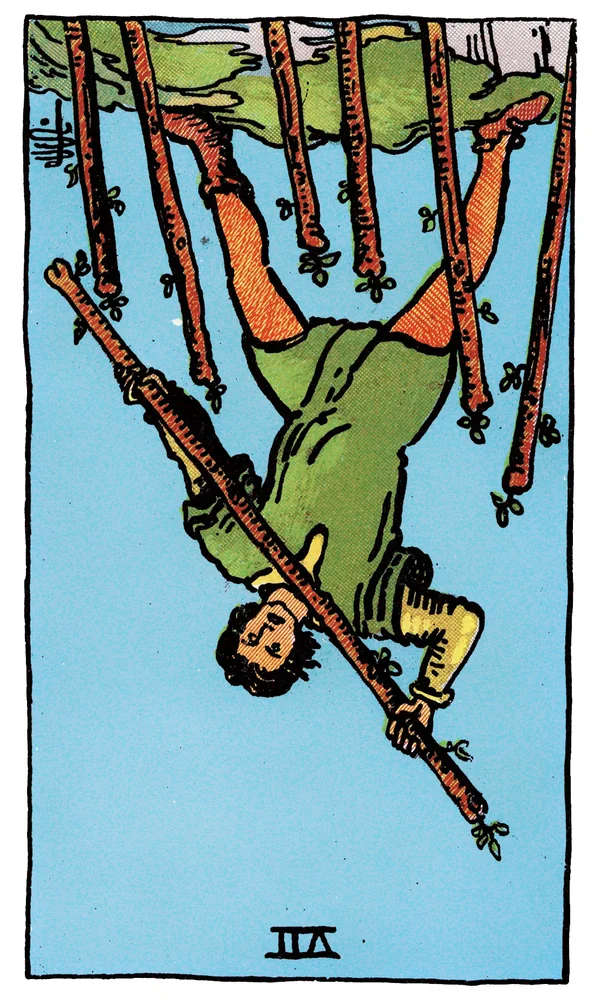 Carte de tarot Sept de Bâtons inversée