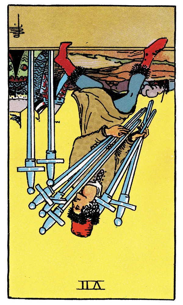 Carte de tarot Sept d'Épées inversée